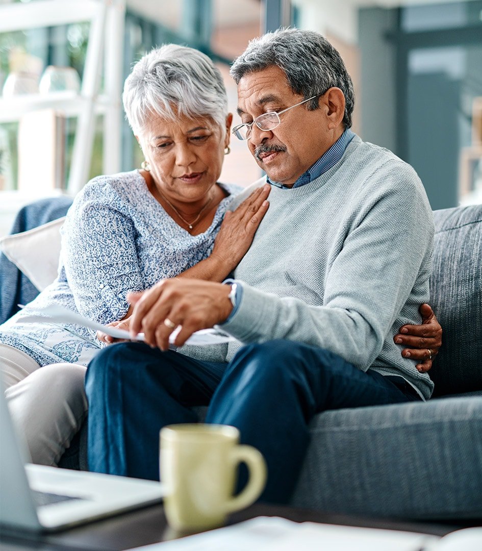couple-reading-mortgage-documents